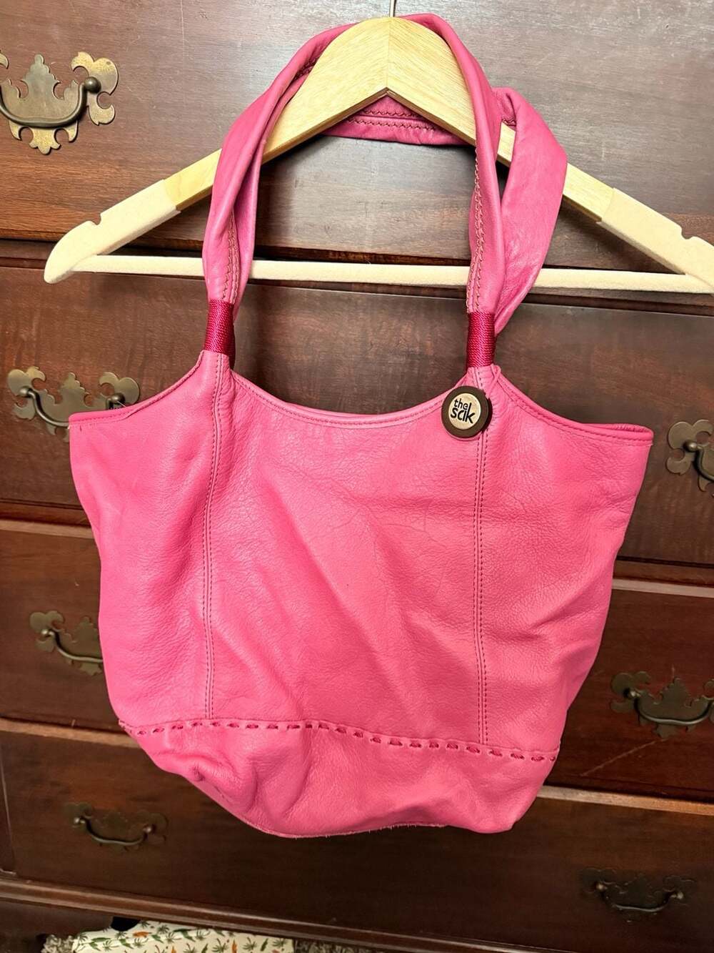 The Sak Pink Leather Hobo Shoulder Bag With Wooden Logo Charm